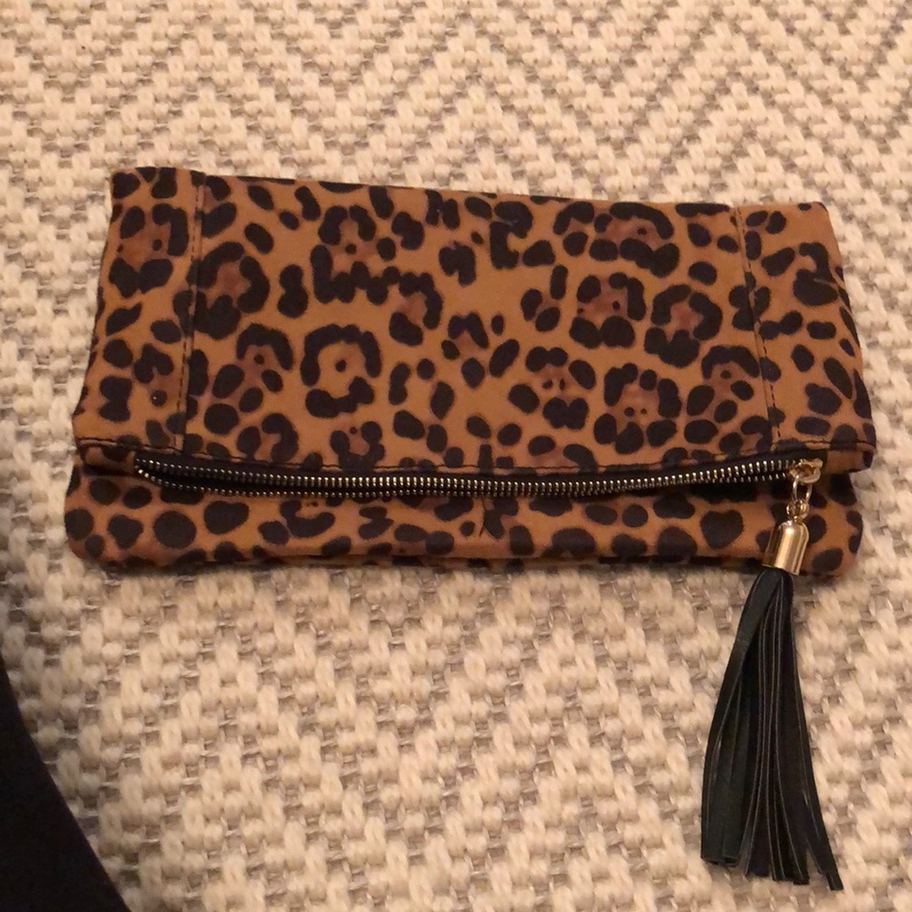 Sole Society Suede Leopard Fold Over Zipper Clutch with magnetic closure.